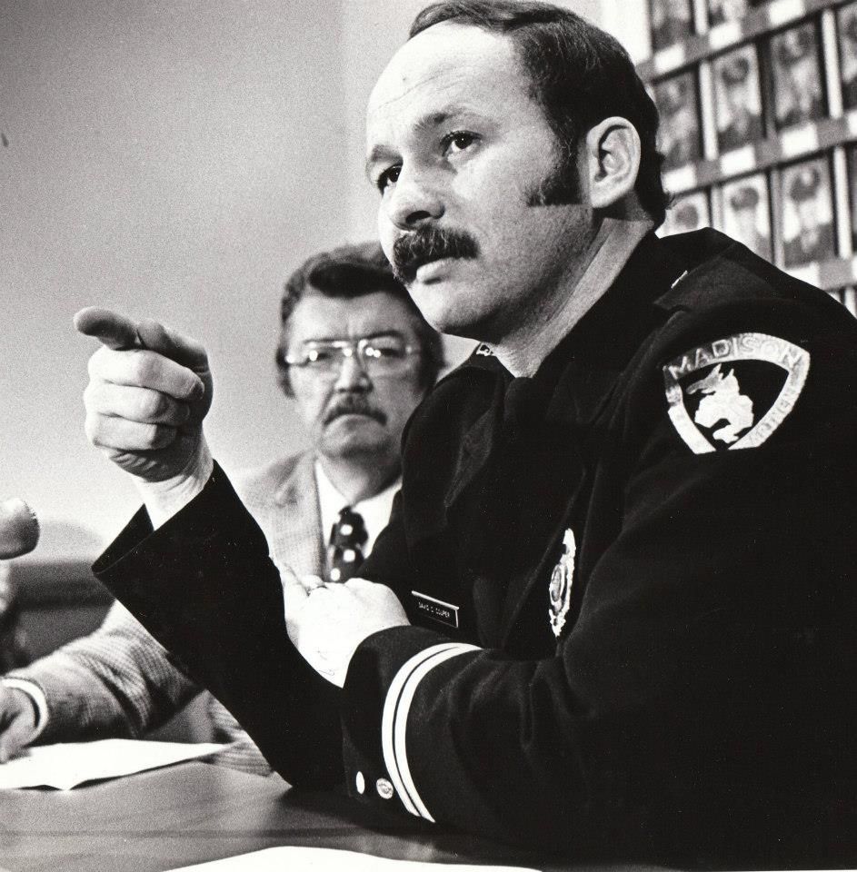 David C. Couper, right, in an undated photograph, during his tenure as chief of police. 