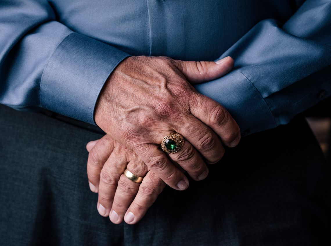 Ray Spencer wearing his class ring after obtaining a Ph.D. in psychology while in prison. 