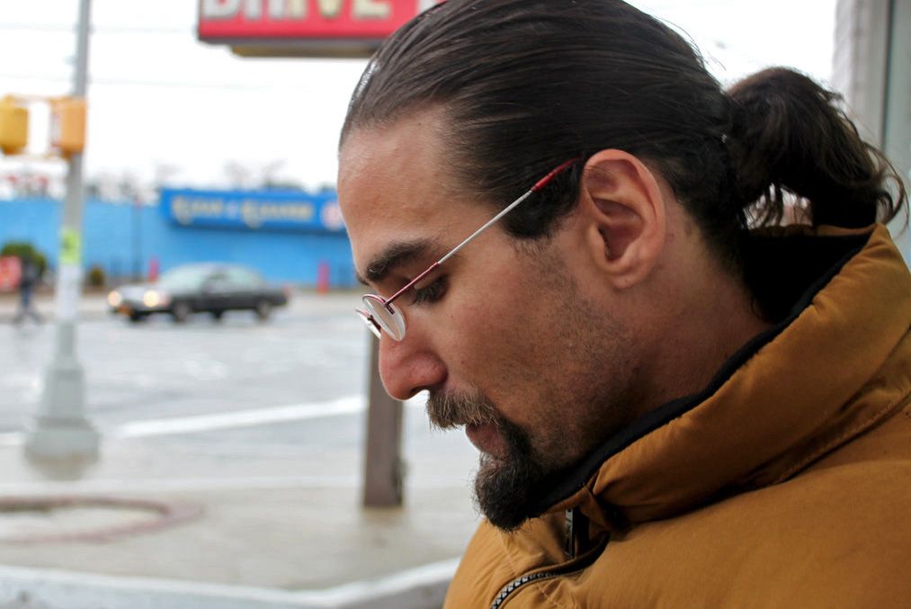 Yantz taking a smoke break in December, not far from the three-quarter house where he’s lived since his release. 
