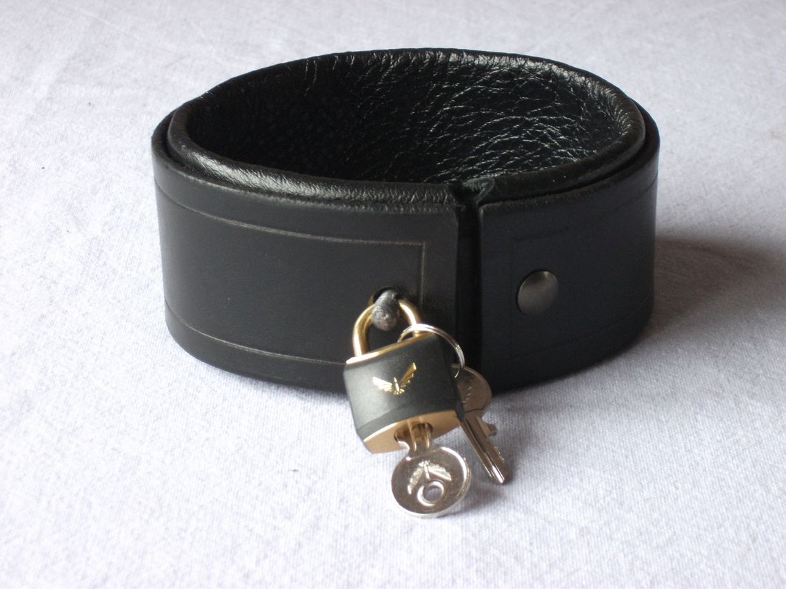 A bondage collar with lock. 