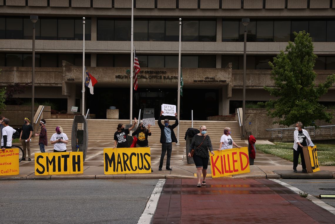 Demonstrators gather outside City Hall in Greensboro, N.C., on May 3, 2021 to protest the death of Marcus Smith after police hogtied him in September 2018.