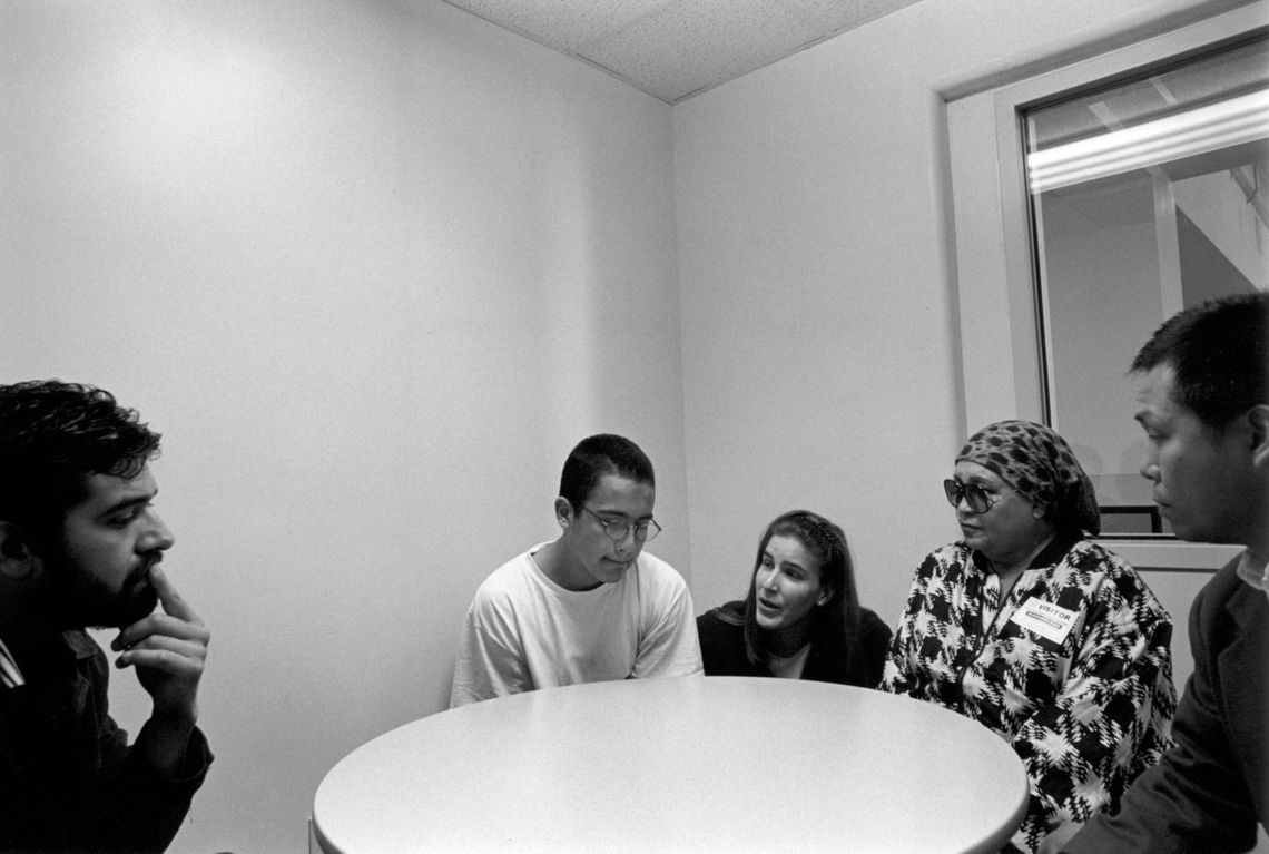 Jose meets with his public defender, grandmother, probation officer, and mental health worker before appearing in court. (San Jose, 1999) 