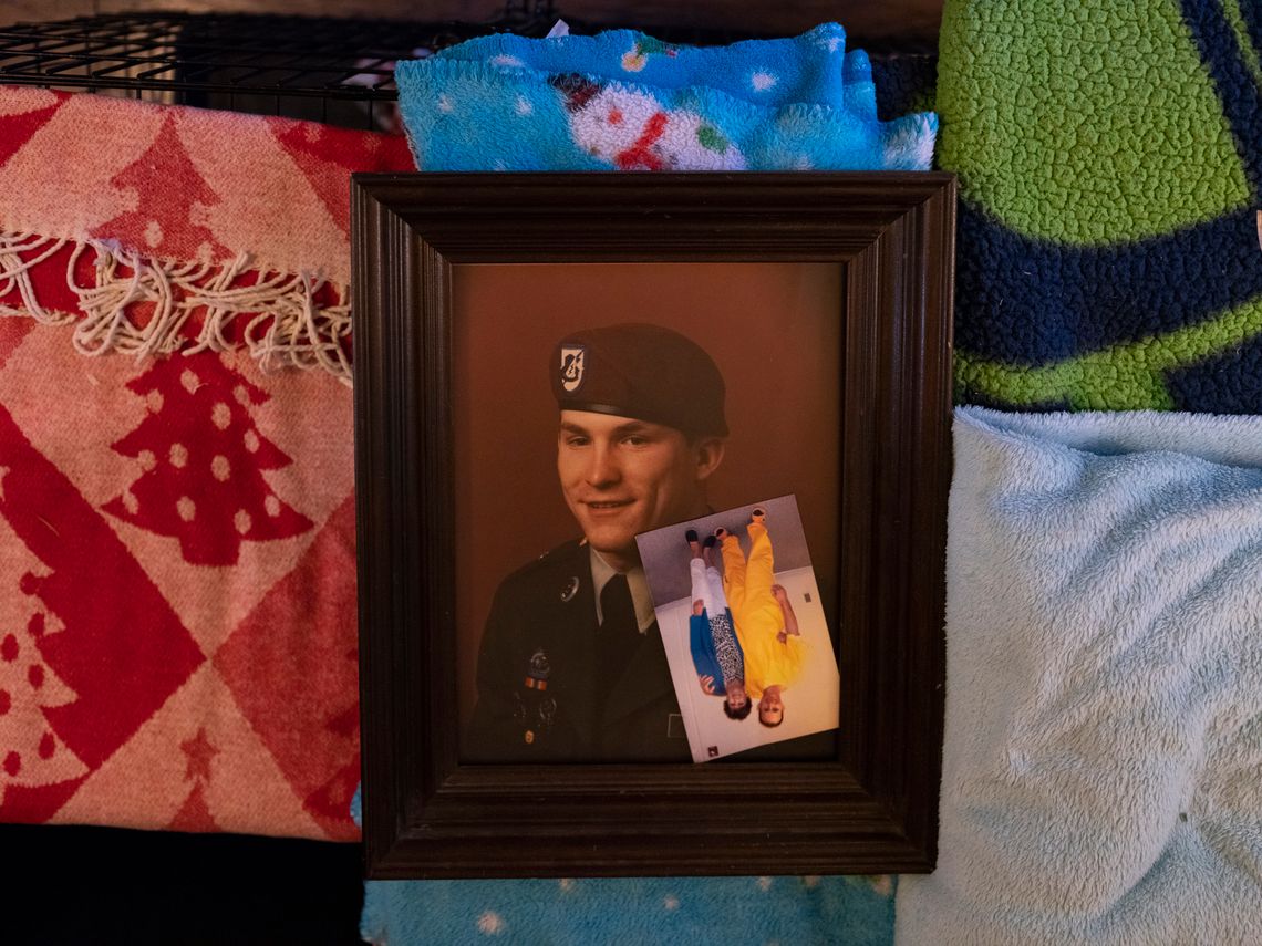 Photos of Chuck in his military uniform and with his mother, Donna, during one of their few visits while he was incarcerated.