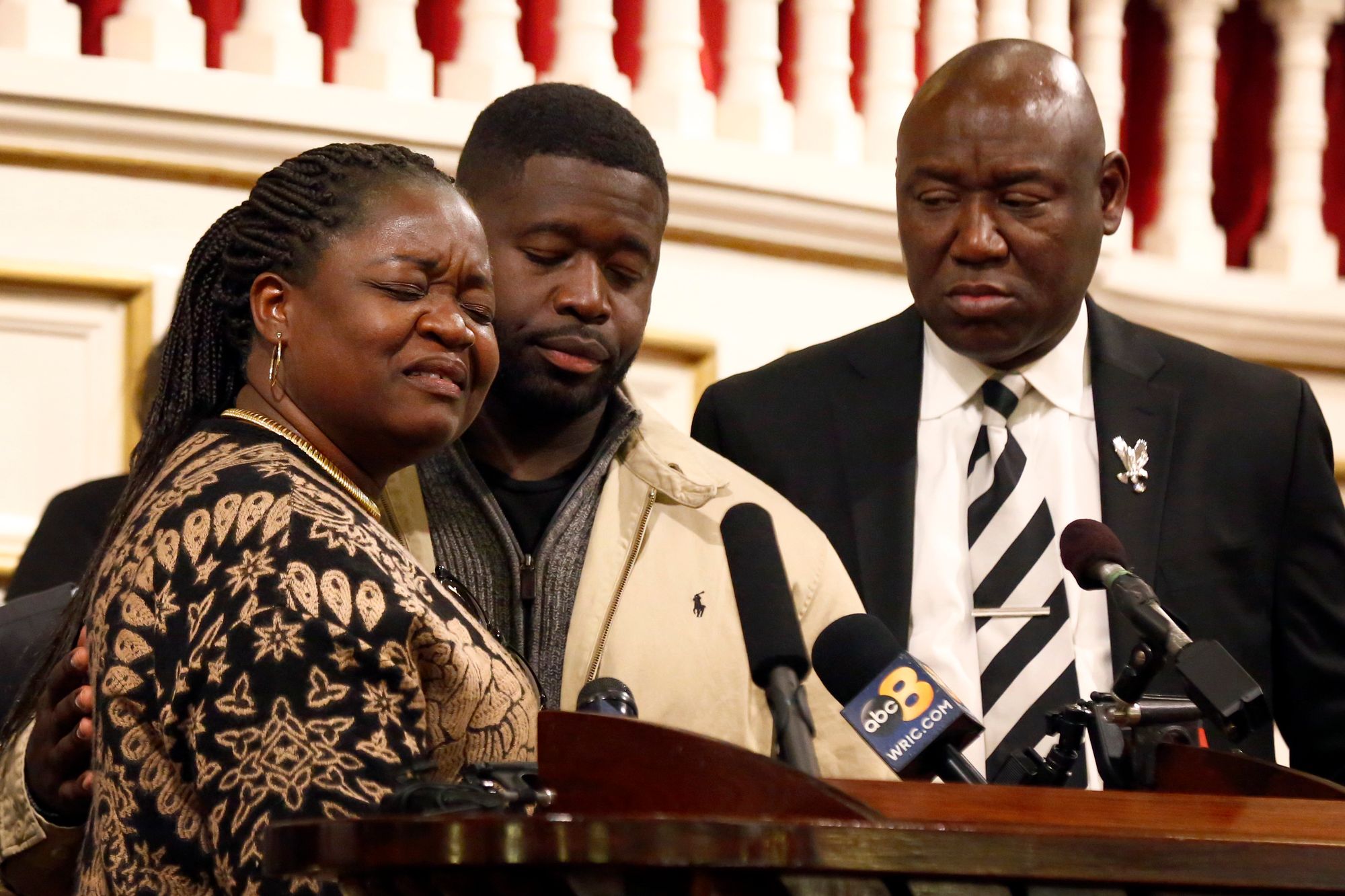 From left, Caroline Ouko, mother of Irvo Otieno, with her older son, Leon Ochieng, and attorney Ben Crump, in Richmond, Va. Otieno died while in custody at a psychiatric hospital.

