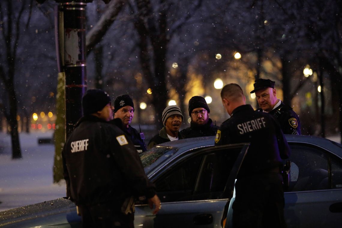 Cook County Sheriff's officers are omnipresent in the community around the jail. Here a man is stopped by five officers and is accused of breaking into cars. 