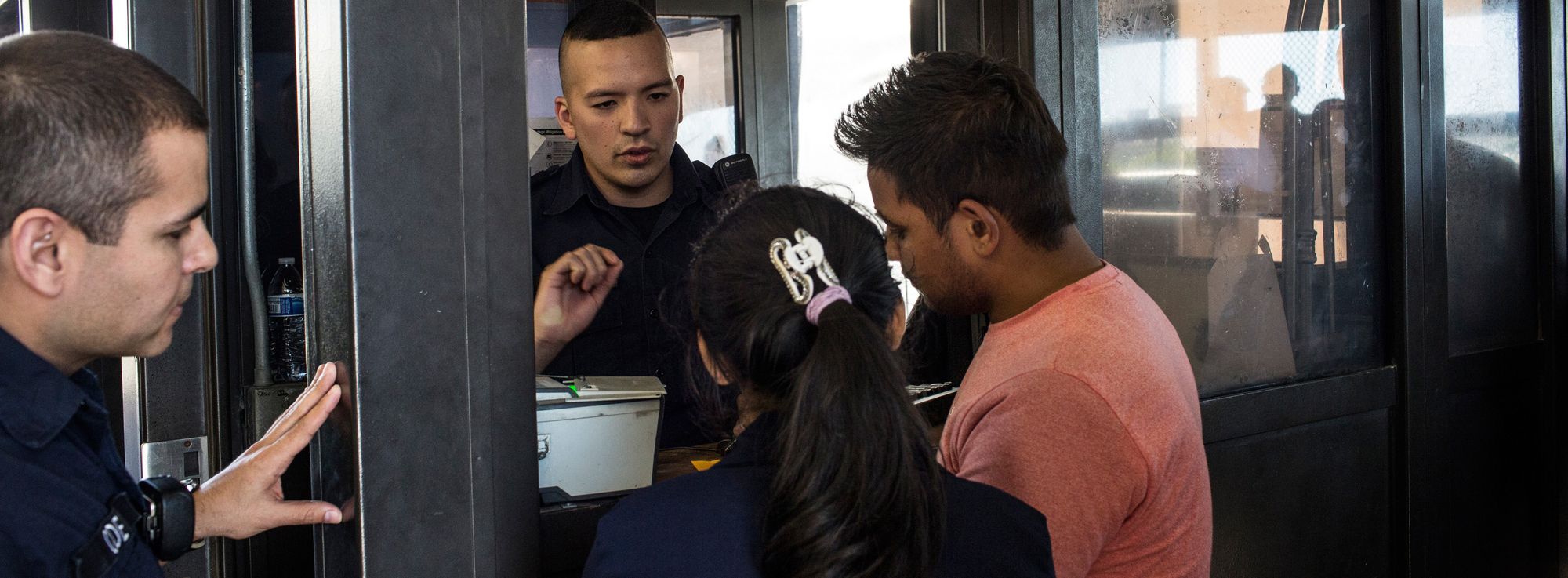 Just about every day, migrants walk across the Gateway to the Americas pedestrian bridge from Mexico to Laredo, Texas, to approach U.S. customs officers, saying they are afraid to return to their home countries. That act starts the legal process for them to apply for asylum. In October 2017, a couple from India had their first encounter with a customs officer at the bridge. In the last three months of 2017, about 4,000 people each month came to border stations in Laredo asking for protection. 