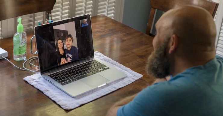 Jason Rochester talks to his wife and son over Facetime. Lynsey Weatherspoon for The Marshall Project