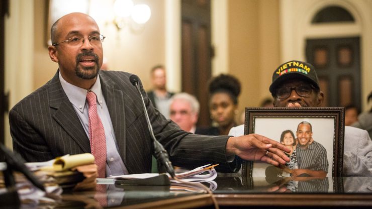 Jacque Wilson, left, and his father, Mack Wilson, right, testify about their brother and son Neko Wilson, during a California Assembly Public Safety Committee hearing at the State Capitol in Sacramento in June. 