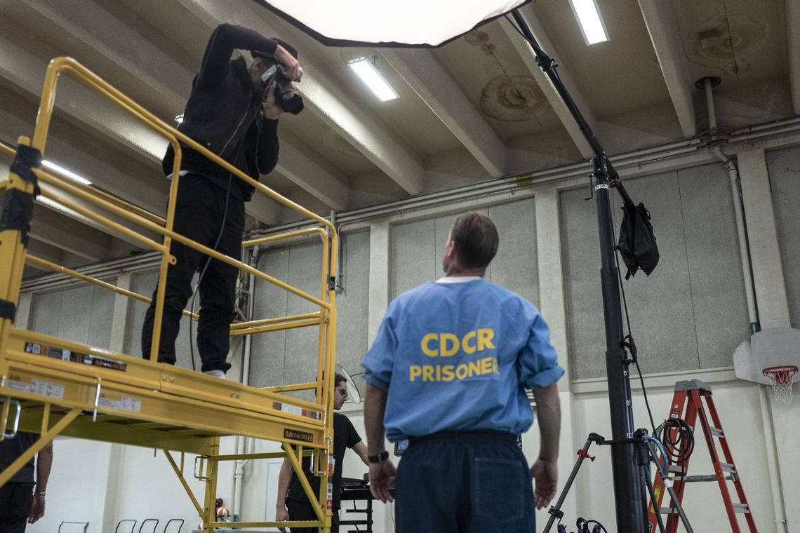 JR photographing Barrett Fadden, who is incarcerated at California Correctional Institution. "Participating in the project was a once-in-a-lifetime experience," wrote Fadden, who is currently serving a life with parole sentence for possessing a deadly weapon while in prison—his third strike. "I hope people see value in us after this."
