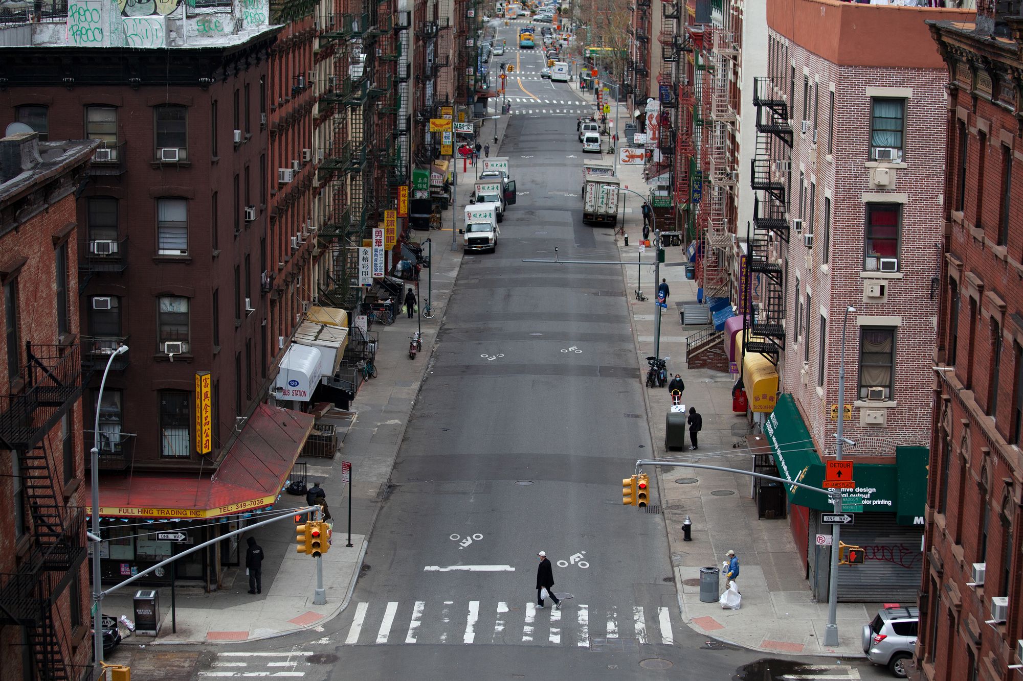 A man walks through Chinatown during the coronavirus outbreak.