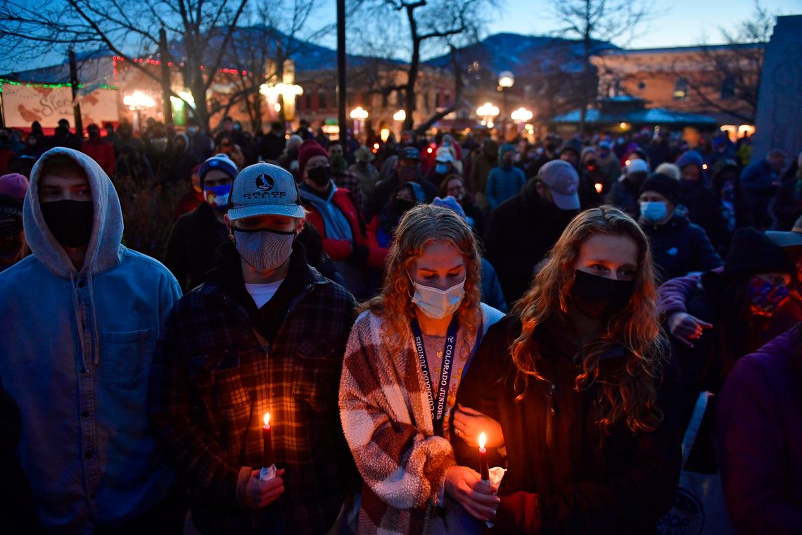 A candlelight vigil honored the 10 victims of the mass shooting at the King Soopers grocery store in Boulder, Colo., on March 24, 2021.