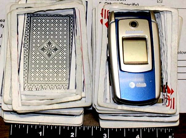 A cell phone discovered in an inmate’s deck of cards. 