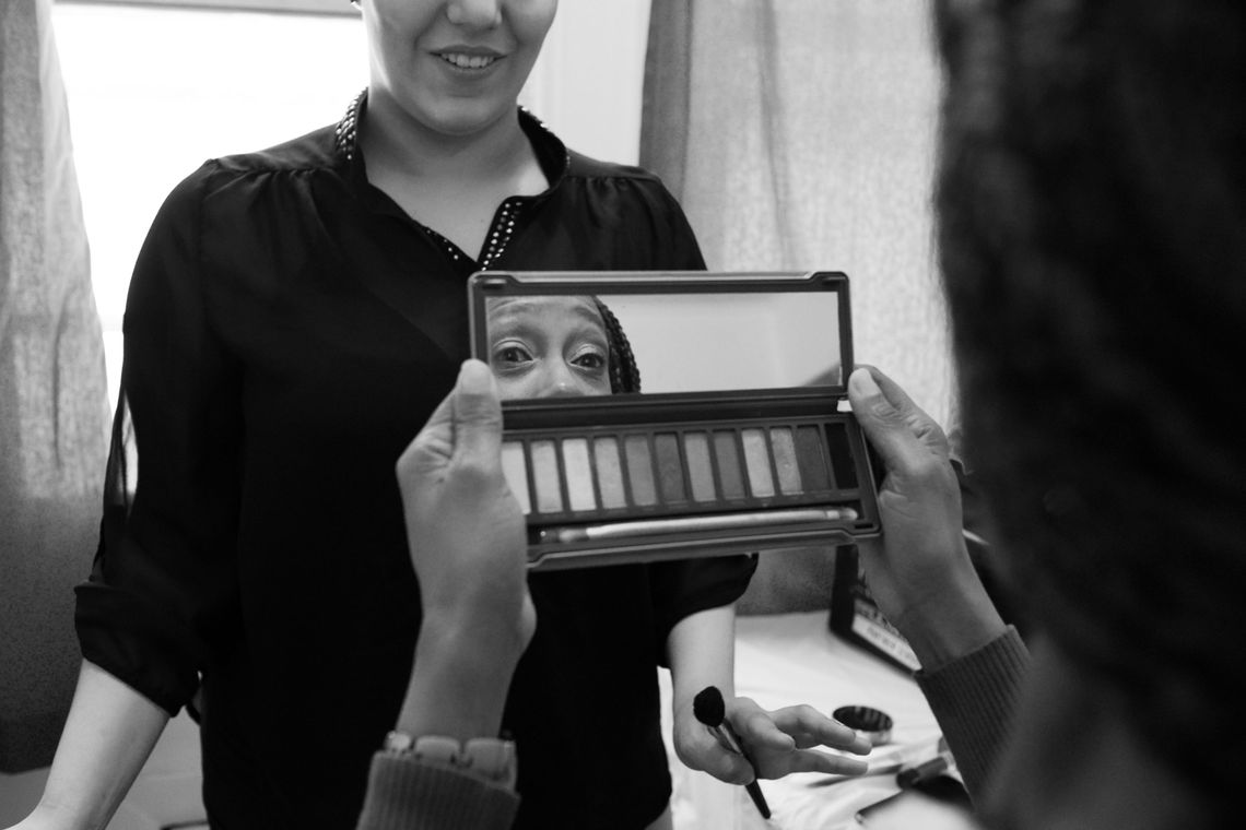 Tracy has her make-up applied by a family friend at her daughter’s home in Bergenfield, N.J. 