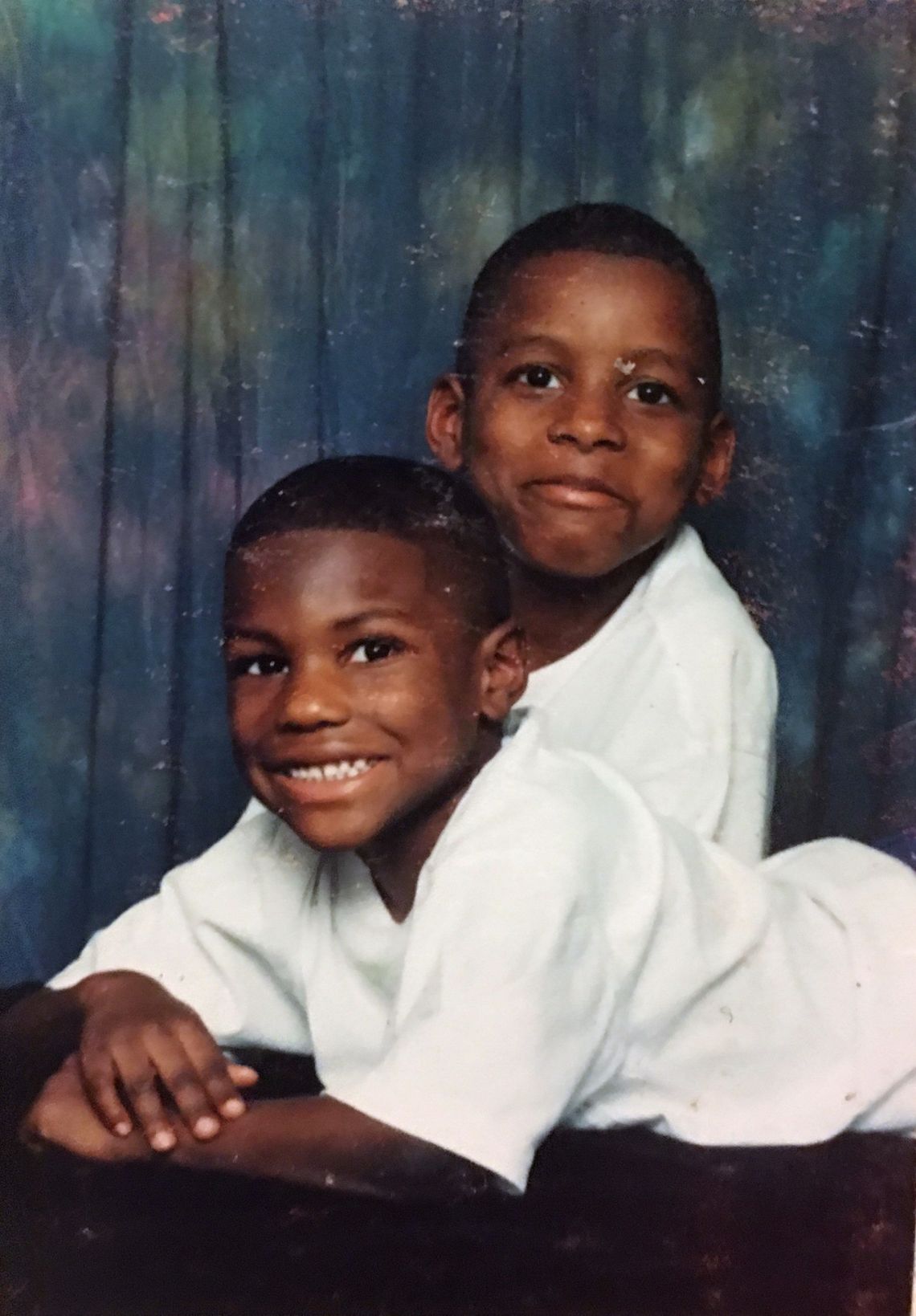 Troy John Woods, left, and Nie-John Woods when they were children. 