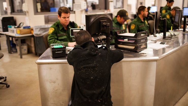 An unaccompanied boy from Guatemala is processed at the Customs and Border Protection Rio Grande Valley sector headquarters in Texas, in 2013. 