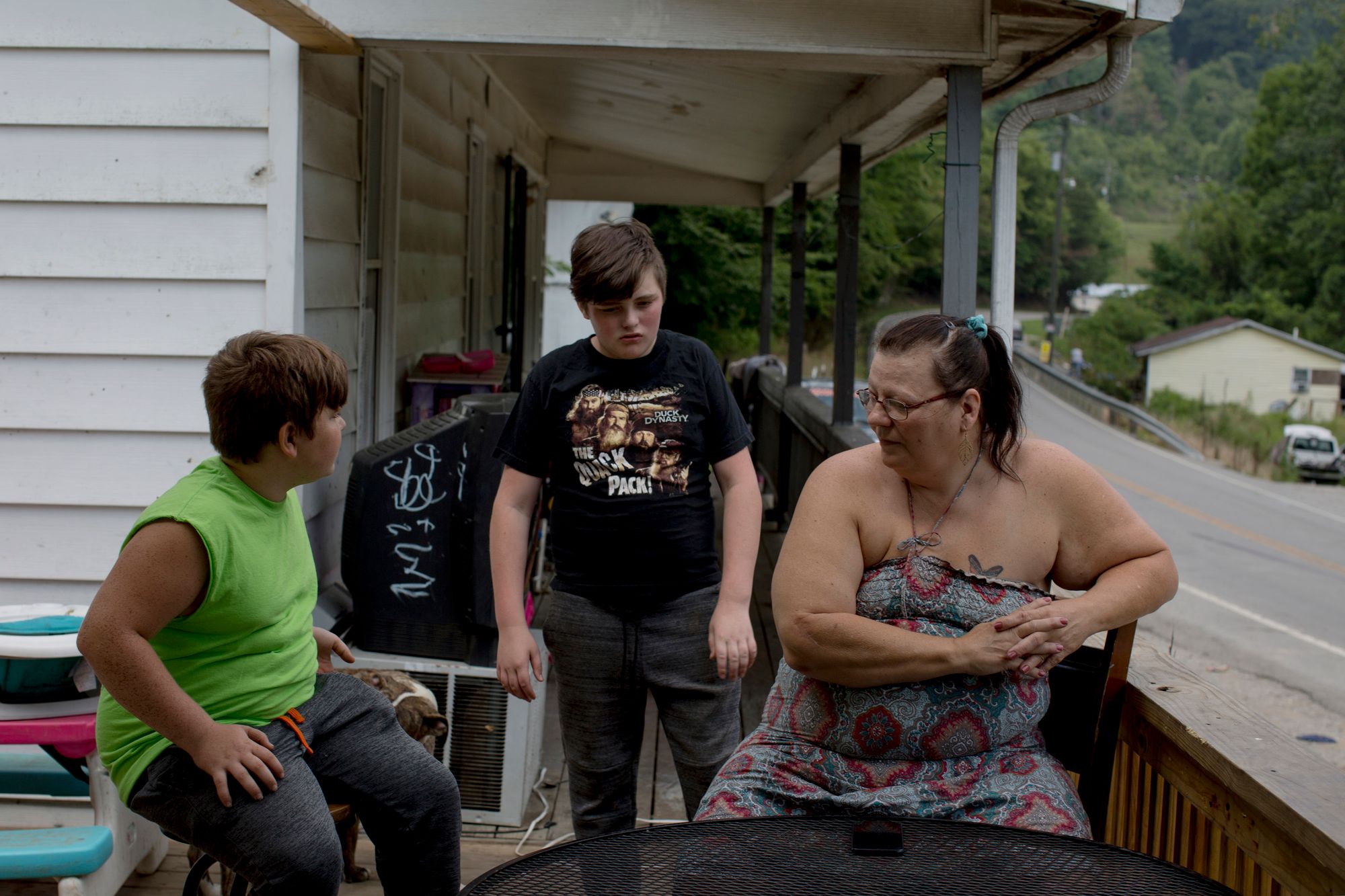 Terrie Jacobs, mother of Christopher Jacobs, with his sons in Pippa Passes, Ky., in August. Christopher was killed by a Kentucky State Trooper in 2017.