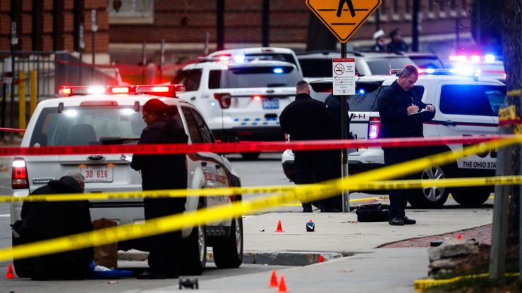 Crime scene investigators collect evidence after 13 people were injured in an attack at the Ohio State University campus in 2016.  