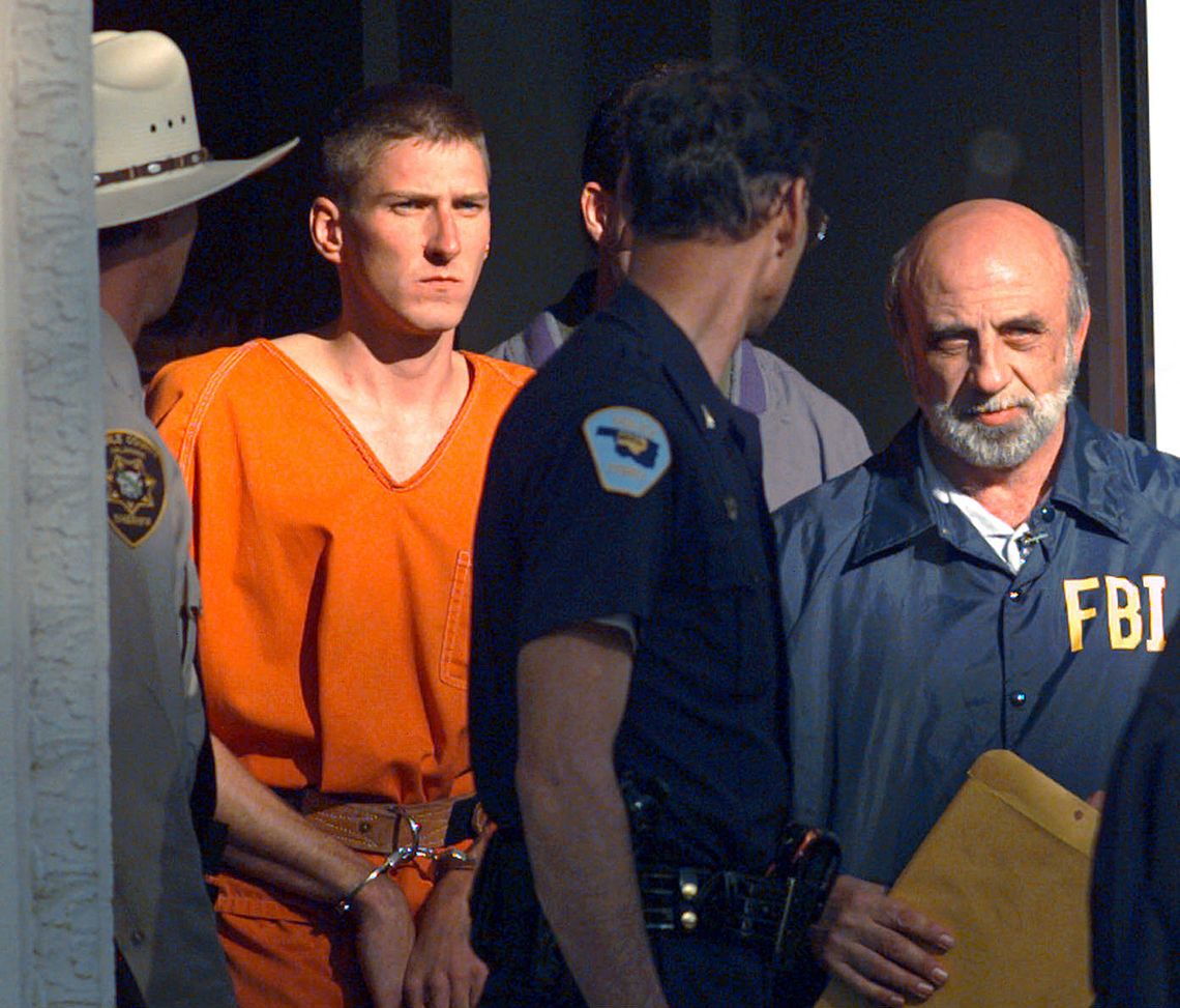 Timothy McVeigh being led out of the Noble County Courthouse in Perry, Okla. in 1995. McVeigh was sentenced to death and executed in 2001. 