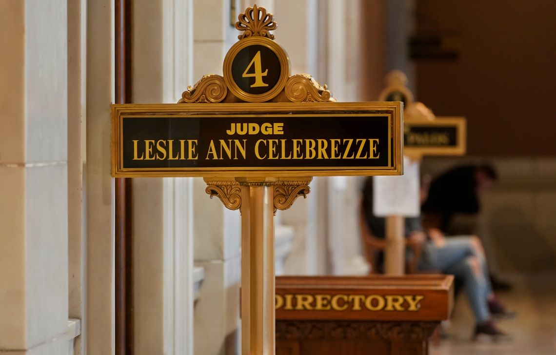 A black and gold plaque reads: “Judge Leslie Ann Celebrezze.”