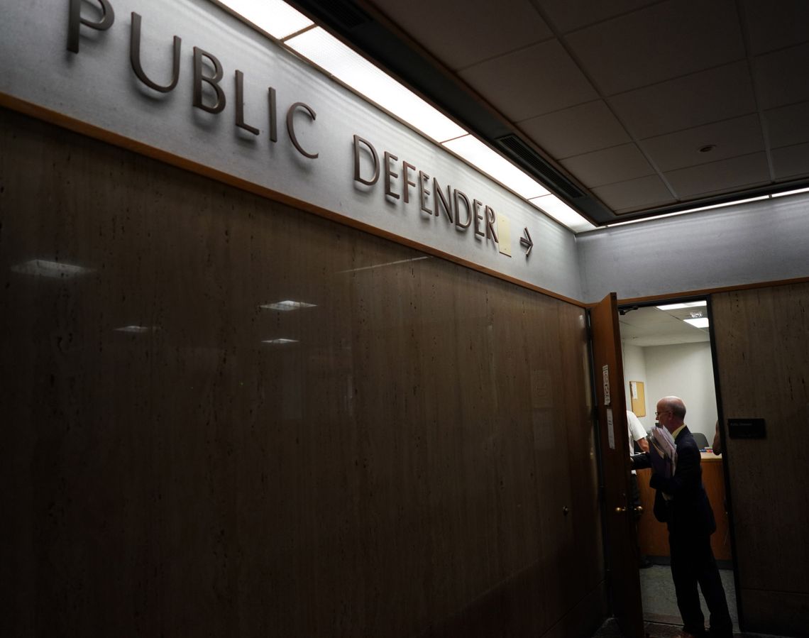 A public defender returns to his office after helping defendants at the Rhode Island District Court in 2017.