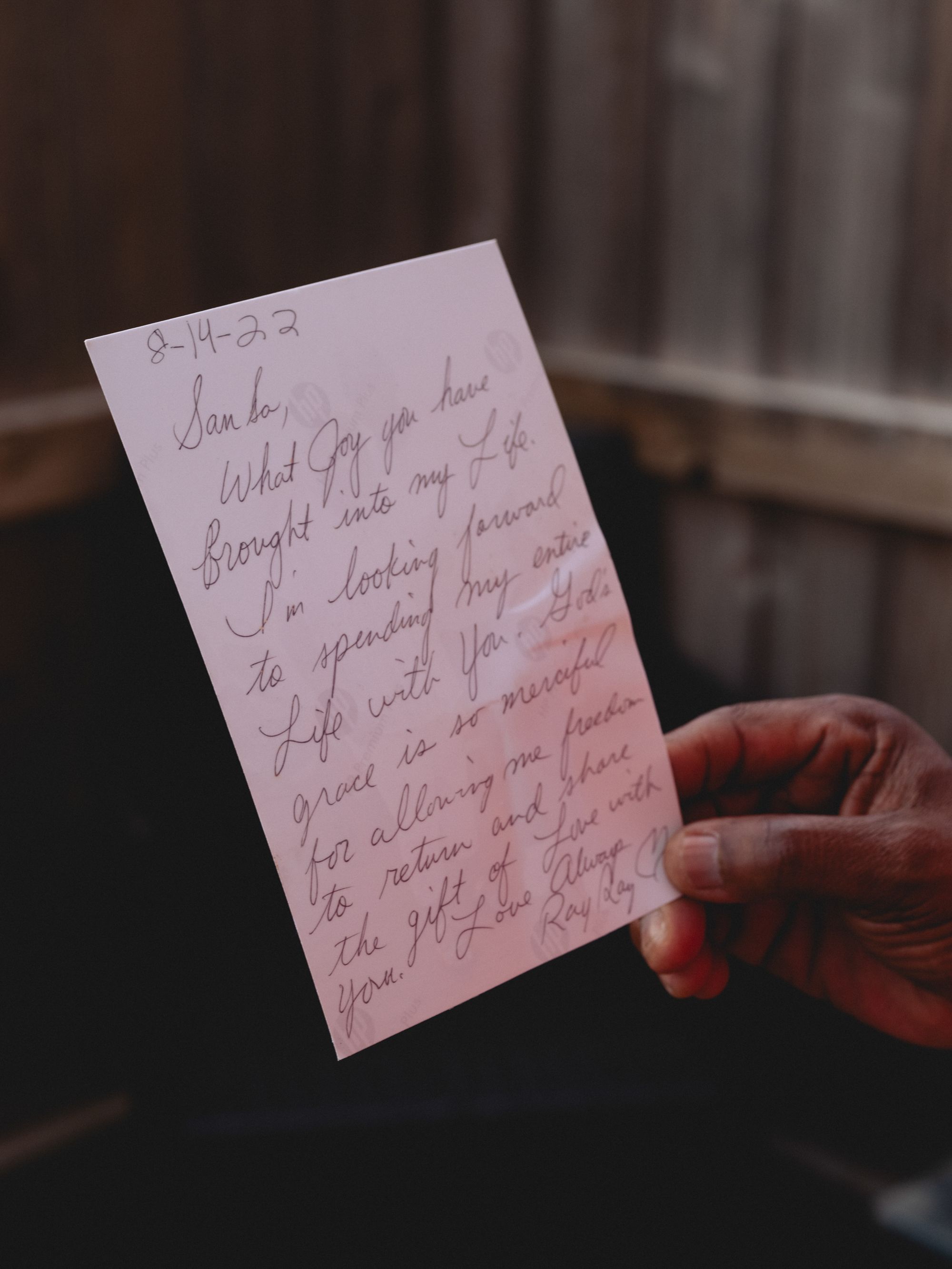 The letter reads: “San Sa, What joy you have brought into my life. I’m looking forward to spending my entire life with you. God’s grace is so merciful for allowing me freedom to return and share the gift of love with you. Love Always, Ray Ray.”