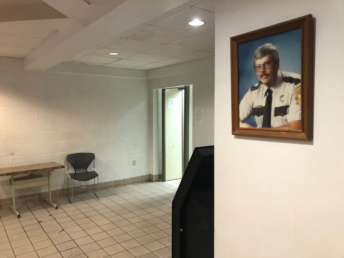 A portrait of Sheriff Daniel Bullock, who has held office since 1992, hangs in the lobby of the St. Francois County Jail. 