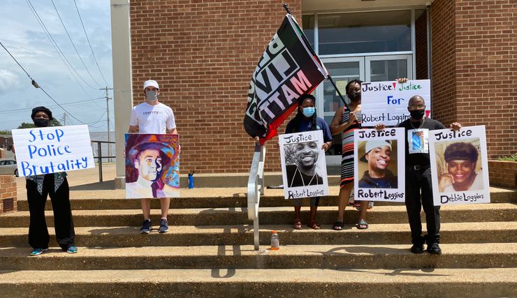 A protest outside the Grenada County Jail in Mississippi on Aug. 21, 2021, over the deaths of Robert and Debbie Loggins, who died years apart after being restrained by officers.