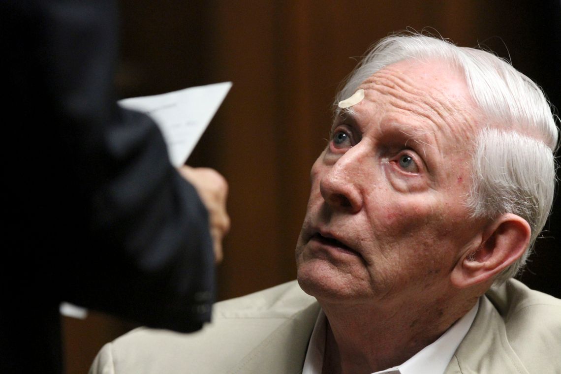 Gerald McFaul, an elderly White man, looks up in a courtroom. 