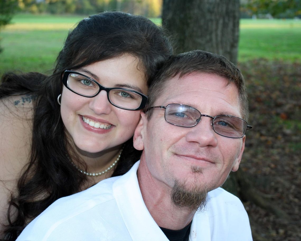 Tony McClurg, left, with his wife, Tiffany McClurg, in 2020. 