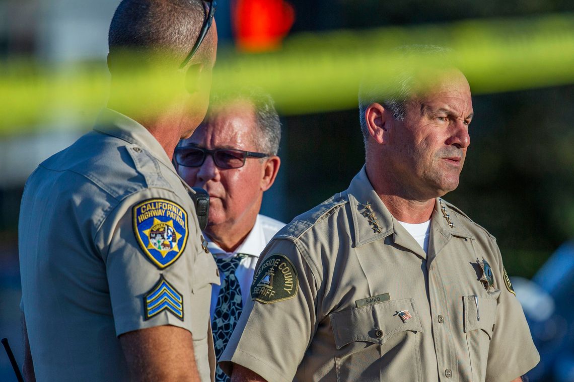 Riverside County Sheriff Chad Bianco, right, at a crime scene in Riverside, Calif., in 2019.