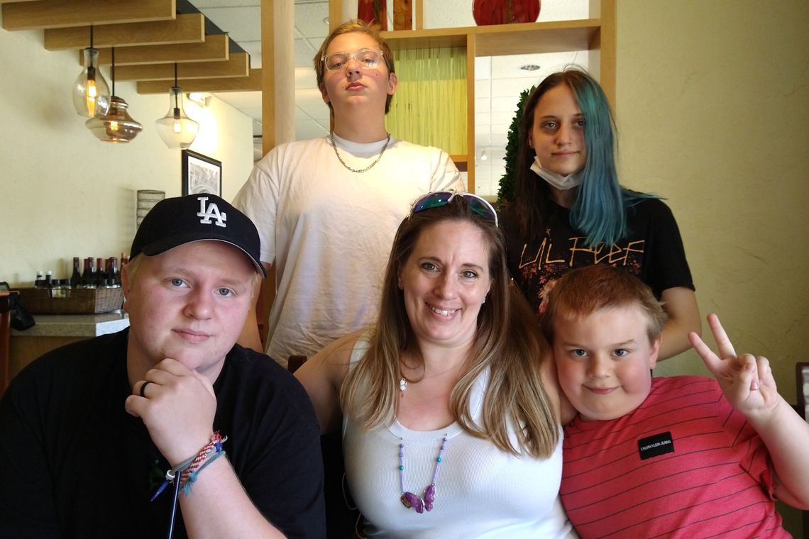 Melissa Godsey with her four children Jared, Mason, Alessia and Colton (clockwise from left). Godsey sued Bureau of Prison officials in 2019 to continue her Suboxone during her 2-year federal prison sentence. 
