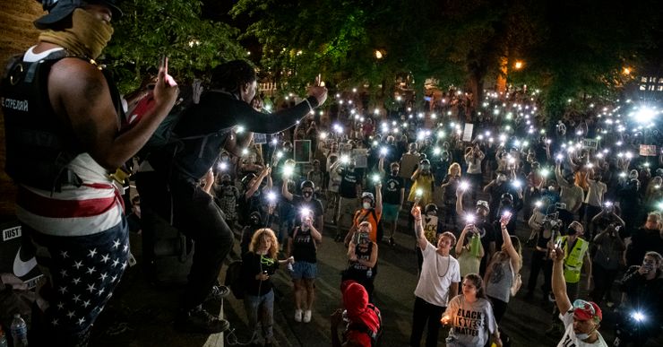 Demonstrators gathered during a night of protest against police brutality and the deployment of federal troops in Portland, Ore., in July 2020.