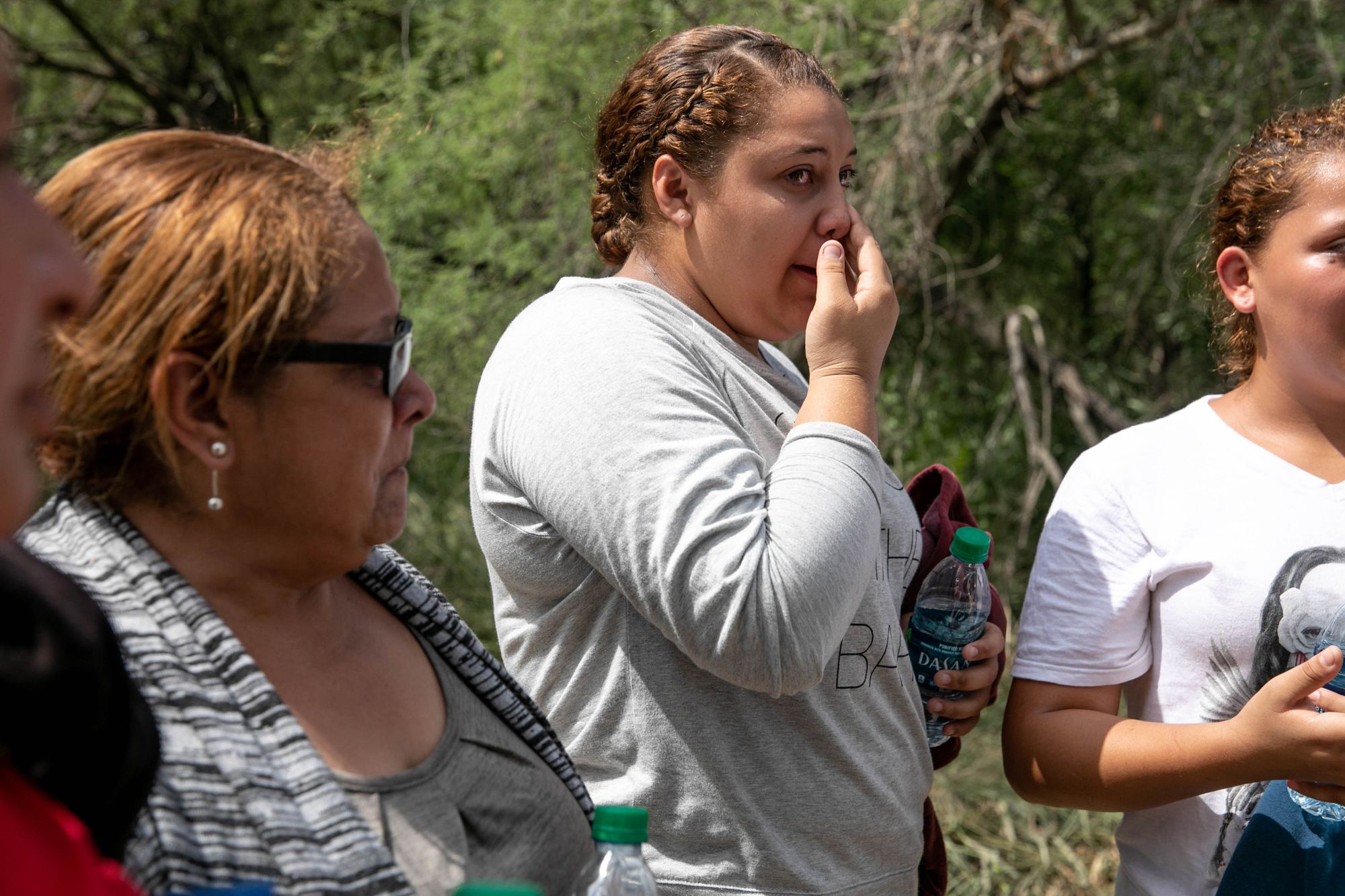 Belmary, 18, wiped away tears as a Border Patrol agent took down information about her and a relative, Edda, 63. They were among a new stream of Nicaraguans coming to the border after recent turmoil there. "I'm scared I'll be sent back," Belmary said. "We can't live there."