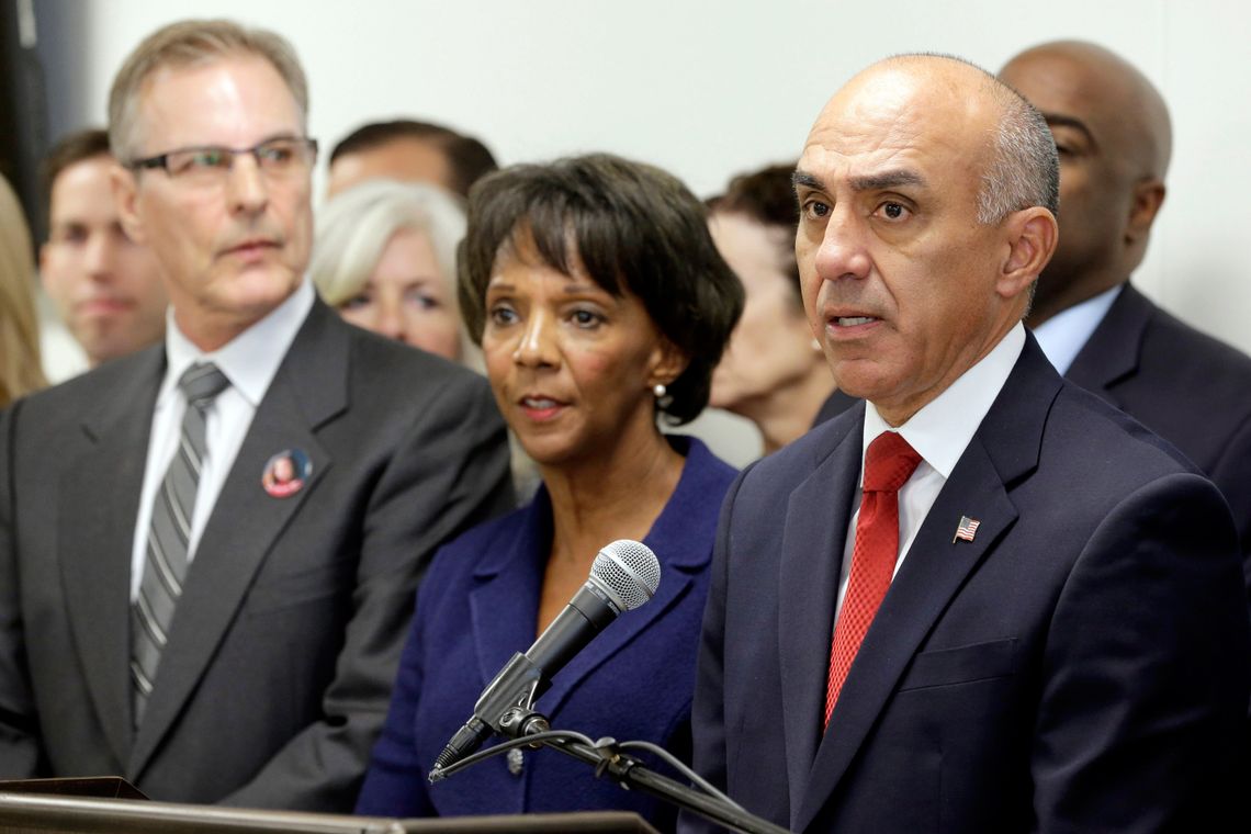 Los Angeles County District Attorney Jackie Lacey, center, and San Bernardino County District Attorney Mike Ramos, right, announce a 2016 ballot initiative to speed up executions for murderers sentenced to death on Oct. 30. in Los Angeles. 