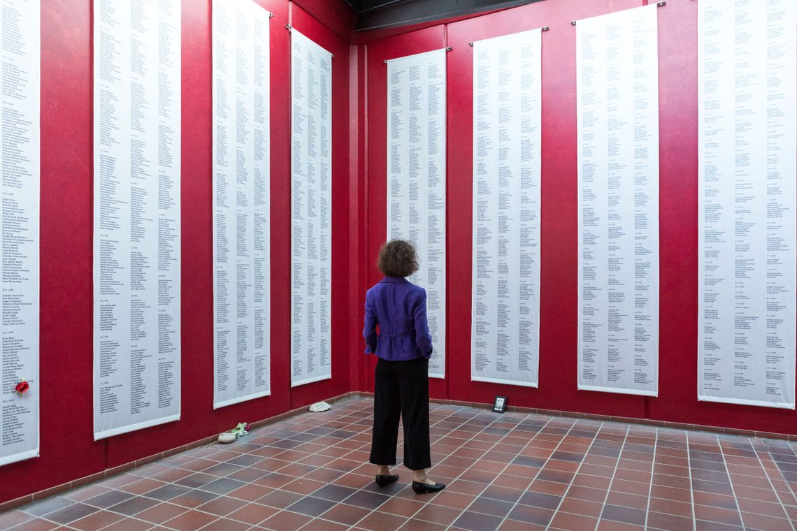 Amy Solomon viewing the names of all the people who came through the Neuengamme concentration camp in Hamburg, Germany. 