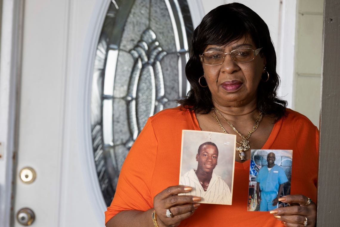 Carolyn Youngblood holds photos of her son Dorian Mackeroy. Based on an earlier juvenile conviction, Mackeroy was designated a prison releasee reoffender after being convicted of a robbery and given a life sentence. He has now been in prison more than 20 years.