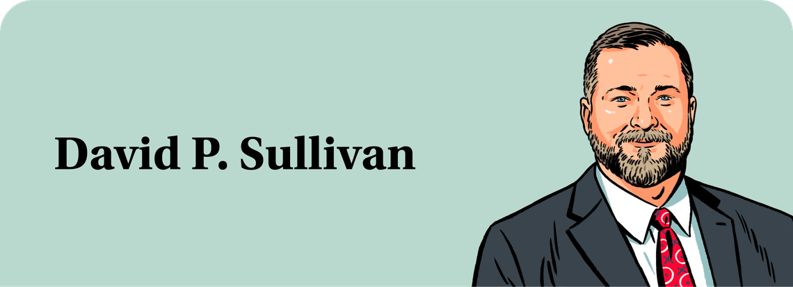 An illustration of David P. Sullivan, a White man with gray hair and a gray beard, wearing a suit and tie. 