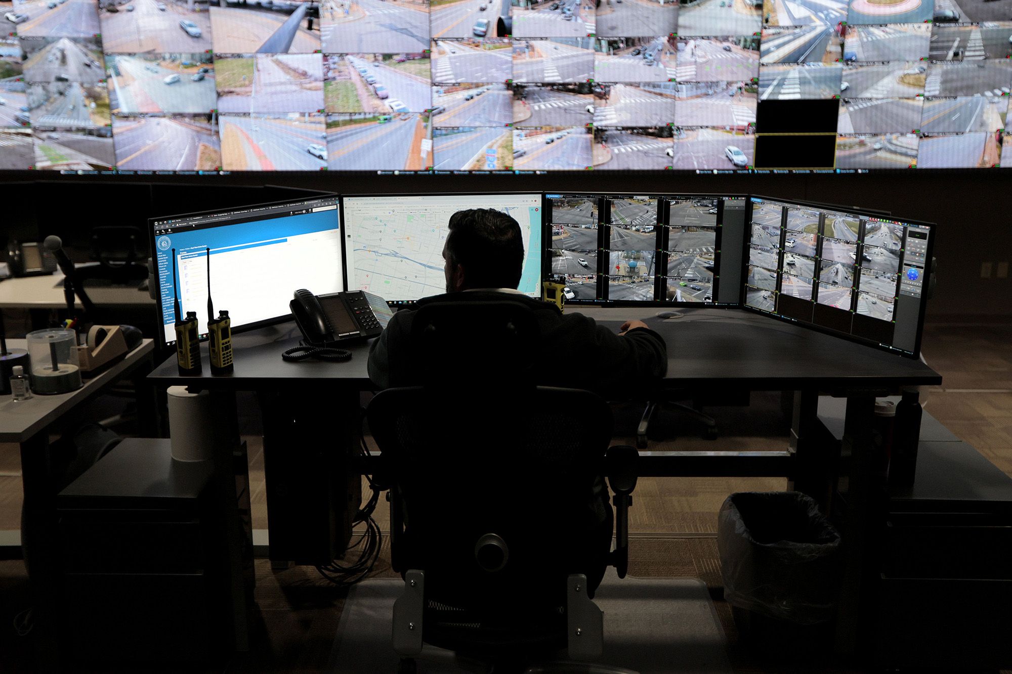 Detective Marco Christlieb works at a station in the Real-Time Crime Center at St. Louis Metropolitan Police Headquarters on Dec. 21, 2023,  in St. Louis, Missouri.