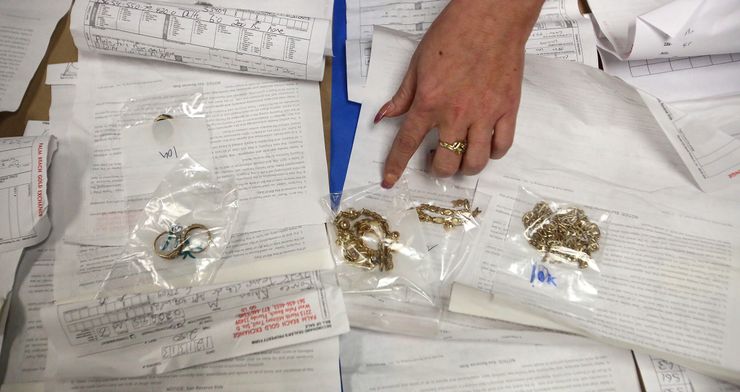 The Palm Beach County, Florida, sheriff’s office displayed stolen items recovered from a second-hand gold dealer in 2014. The threshold for felony theft in Florida is $300.