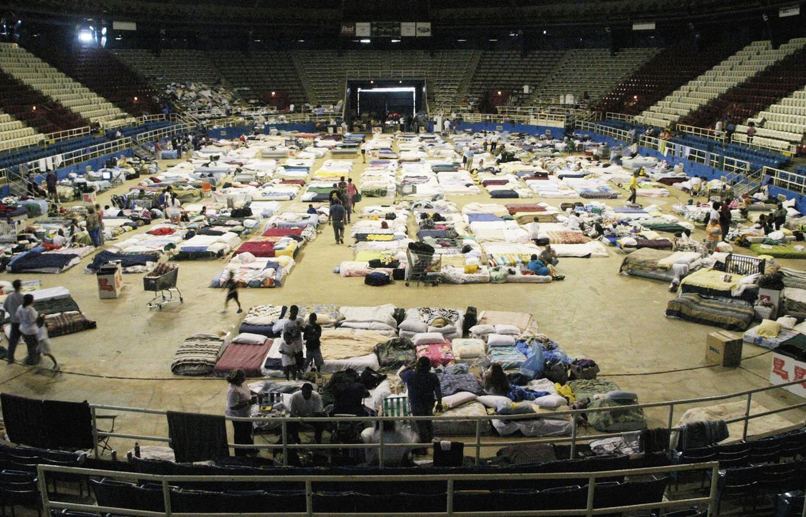 A shelter for people fleeing Hurricane Katrina opened at the Hirsch Coliseum in Shreveport, La., in 2005. Tiffany Woods, Emmanuel Scott and their four small children stayed there before moving to a motel and then a house. 