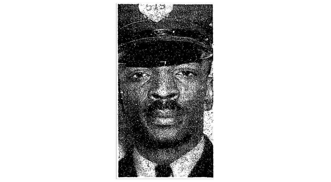 Black-and-white newspaper clipping of the headshot of Lynn Coleman, a Black patrolman, in uniform. Coleman has a mustache and is wearing a police officer’s cap.