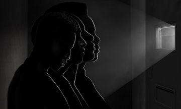 A photo illustration shows the silhouettes of four dark-skinned teens facing a door in a solitary confinement unit. Light shines through a window in the door. As the viewer scrolls up on the story, the light from the window gets brighter.  