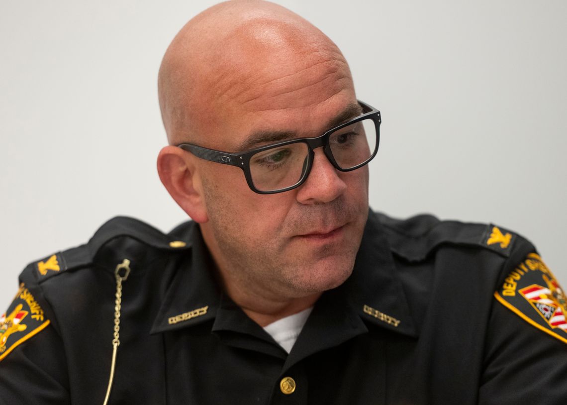 Cuyahoga County Sheriff’s Department Chief Deputy Aaron Reese, a White man, wears glasses and a uniform. 