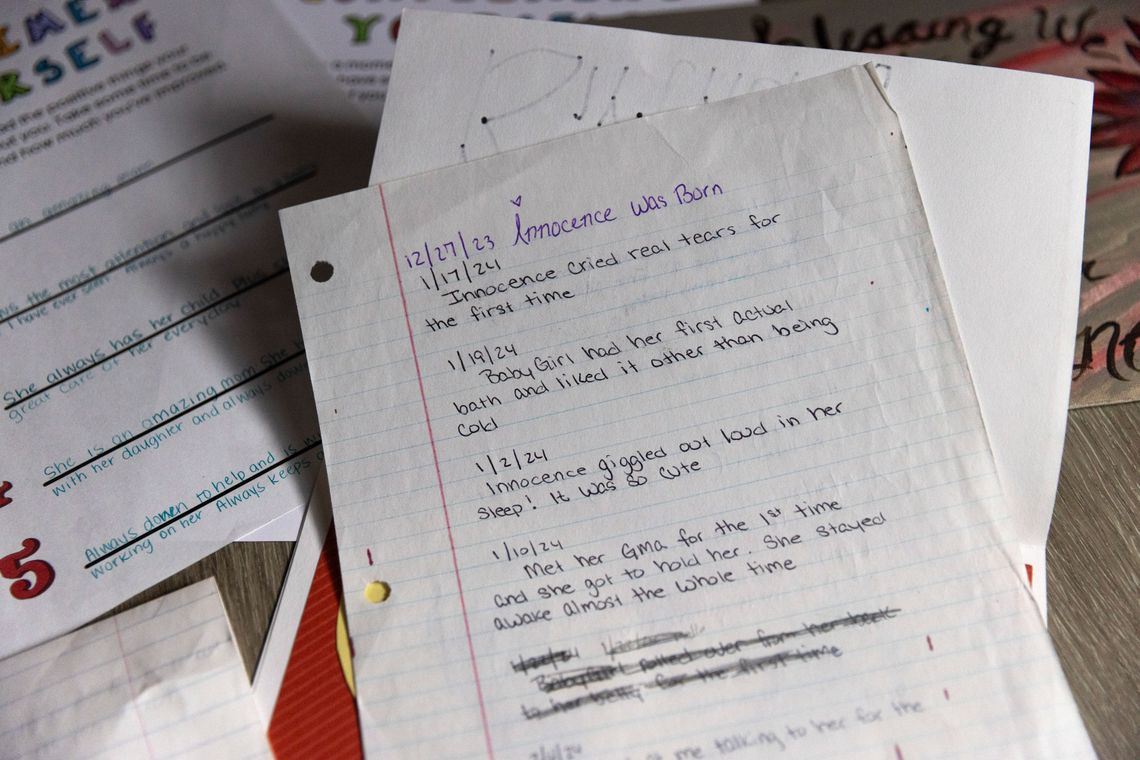 A photo of a lined piece of paper with dated journal entries.