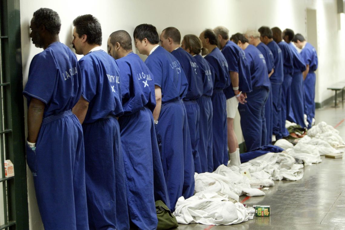 Inmates line up to be strip-searched inside the Los Angeles County Jail in 2005. 