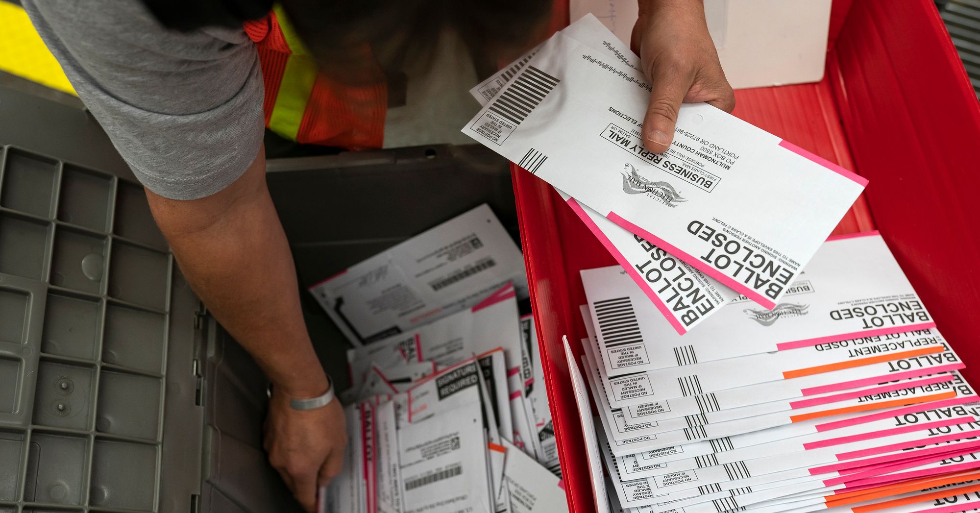 An election worker sorted submitted ballots at the Multnomah County, Oregon, elections office on Nov. 2.