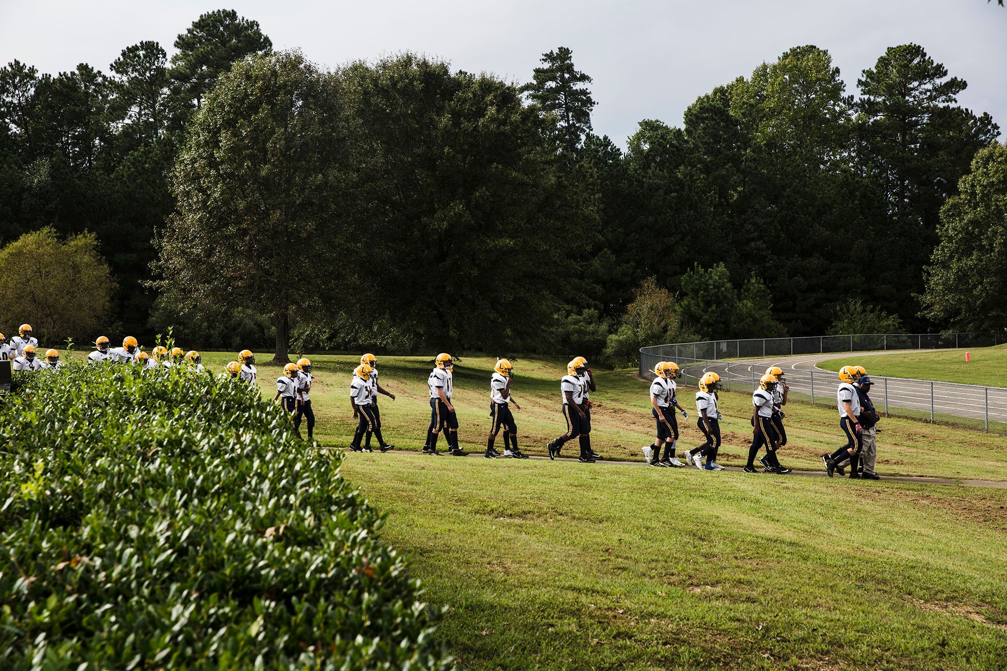 Lori Lynn Adams watches her grandson play football near Raleigh, N.C.