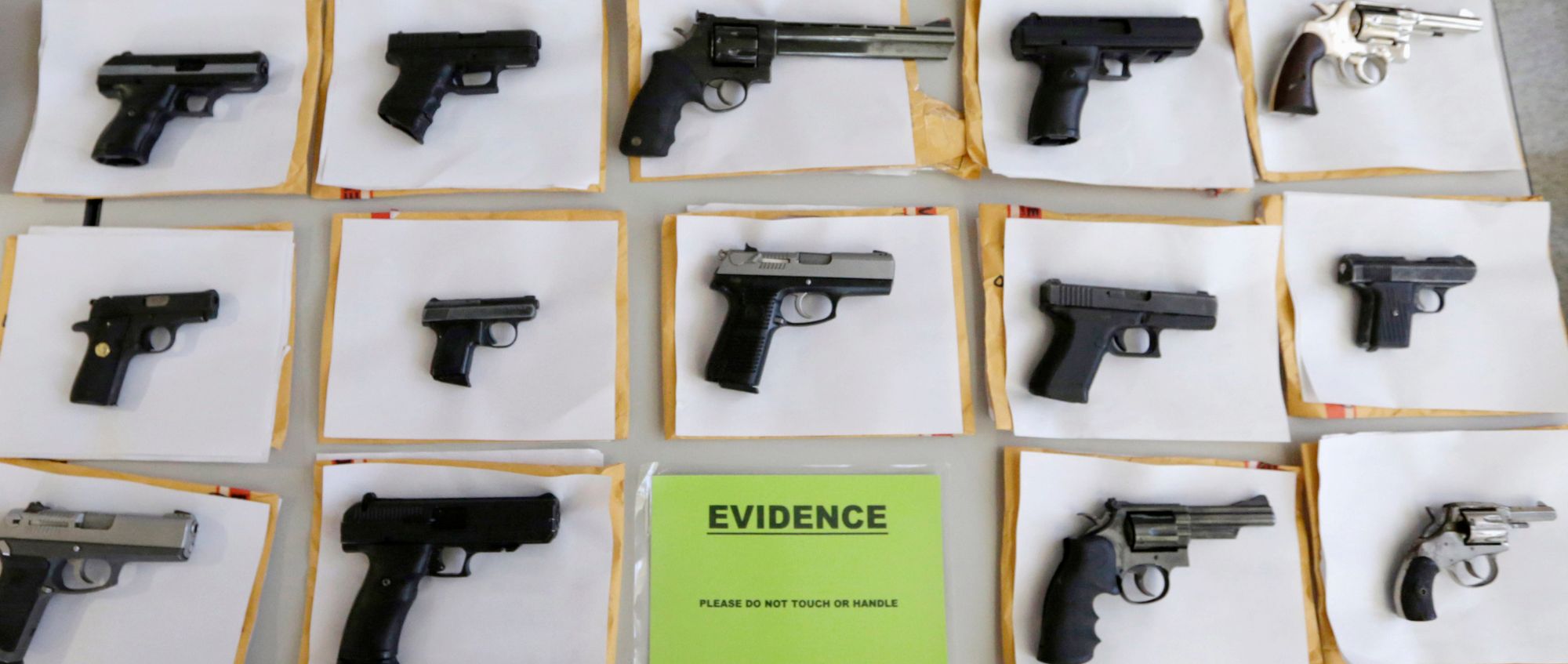 Firearms displayed by Chicago police in 2014 were just a few of the thousands of illegal firearms the department confiscated during the year in their battle against gun violence in Chicago.