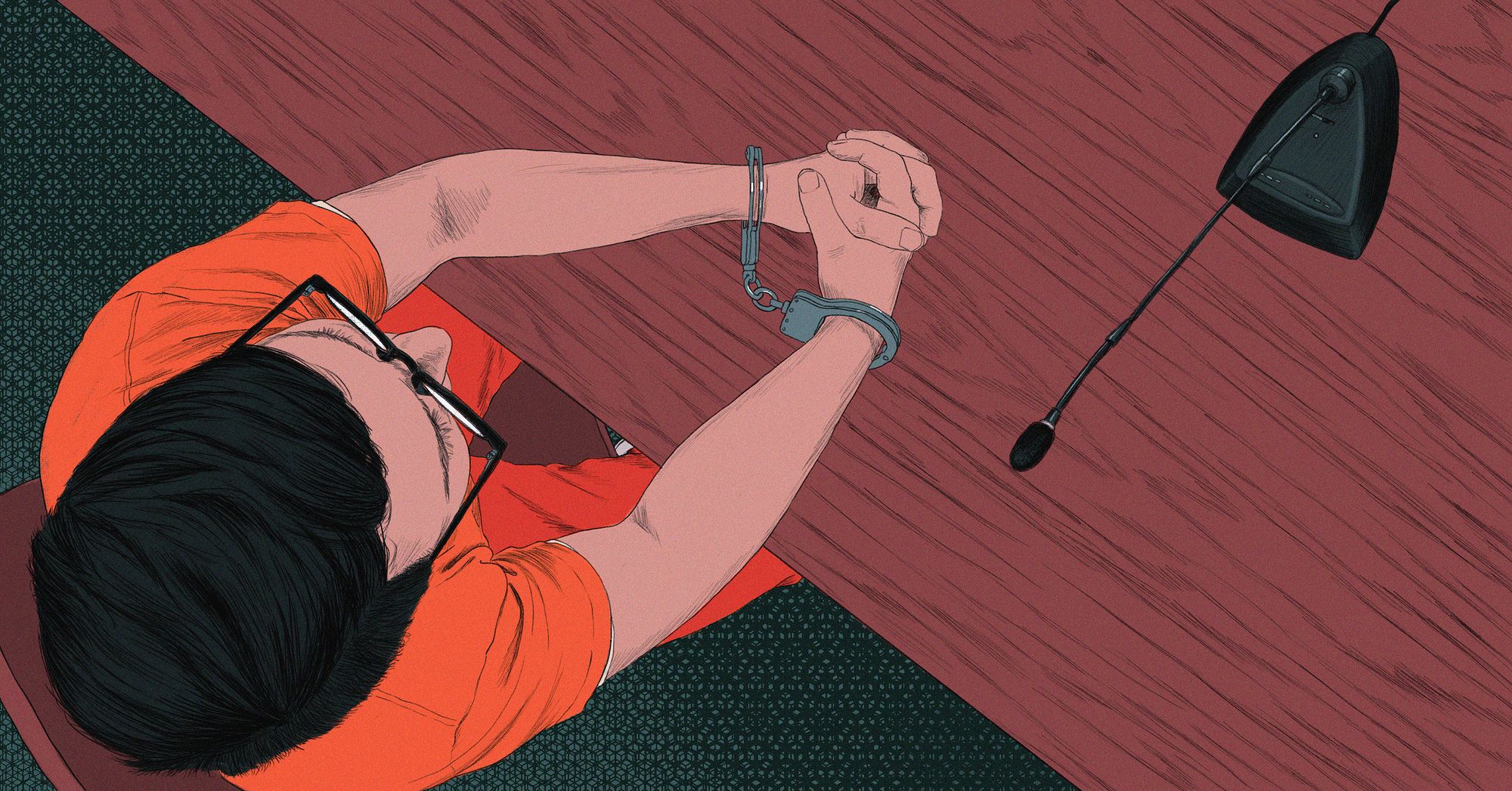 An illustration shows a bird's-eye view of a light-skinned person in an orange prison suit handcuffed, sitting at a table with a courtroom microphone.