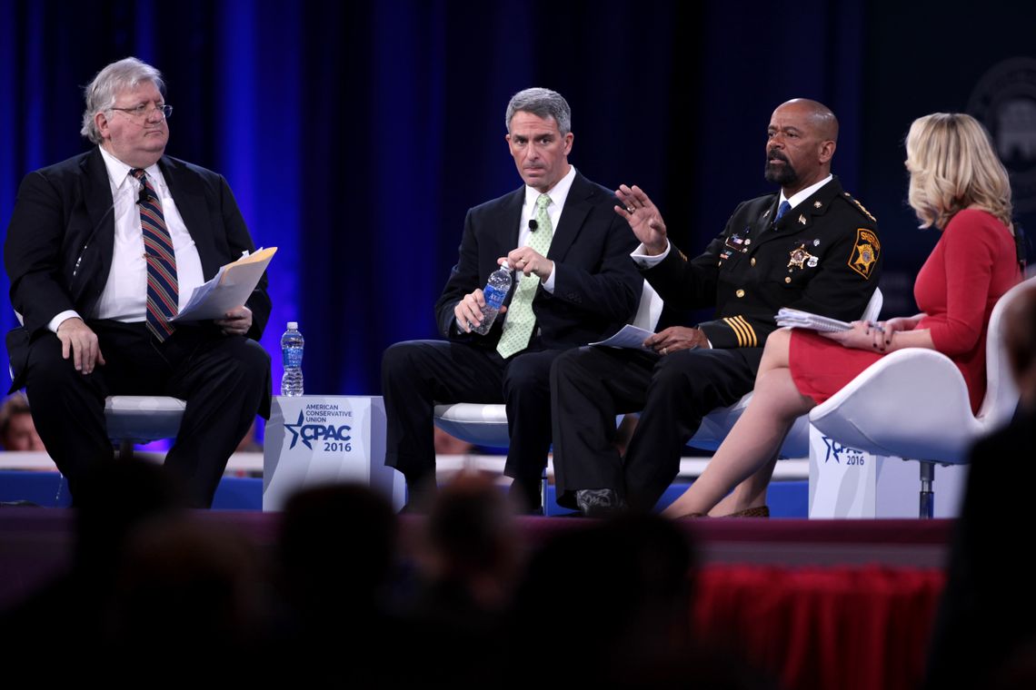 Clarke, middle right, talks with conservative activist Pat Nolan, left, former Virginia Attorney General Ken Cuccinelli, middle, and Washington Times staff writer Kelly Riddell, right, at the annual Conservative Political Action Conference in March in National Harbor, Md.